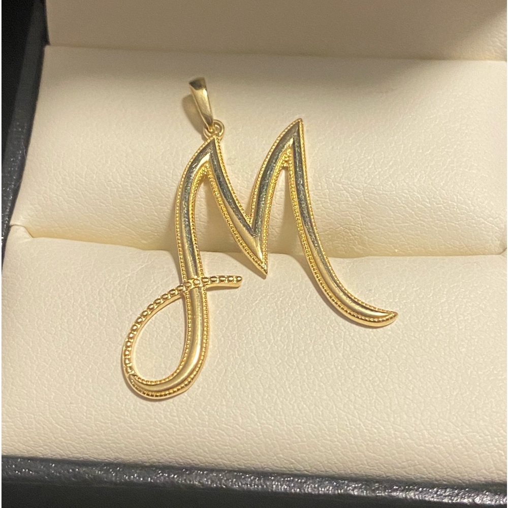Real 18k Saudi gold “M” pendant